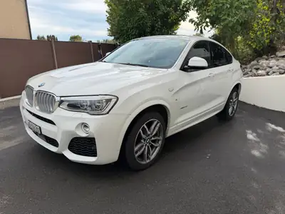 BMW X4 xDrive30d M Sport — SUV coupé premium, 258 ch et toit panoramique — Heckansicht