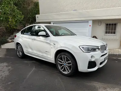 BMW X4 xDrive30d M Sport — SUV coupé premium, 258 ch et toit panoramique — Seitenansicht