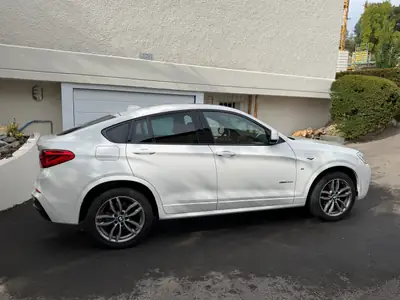 BMW X4 xDrive30d M Sport — SUV coupé premium, 258 ch et toit panoramique — Innenraum