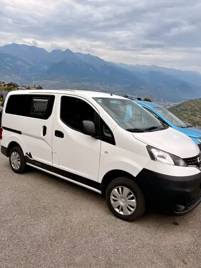 Nissan NV200 1.6 16V Comfort — Utilitaire compact fiable, 86 250 km, EU6 — fianco