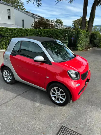 Smart Fortwo Passion 2016 — Citadine iconique, 58 000 km, rouge métallisé — side view
