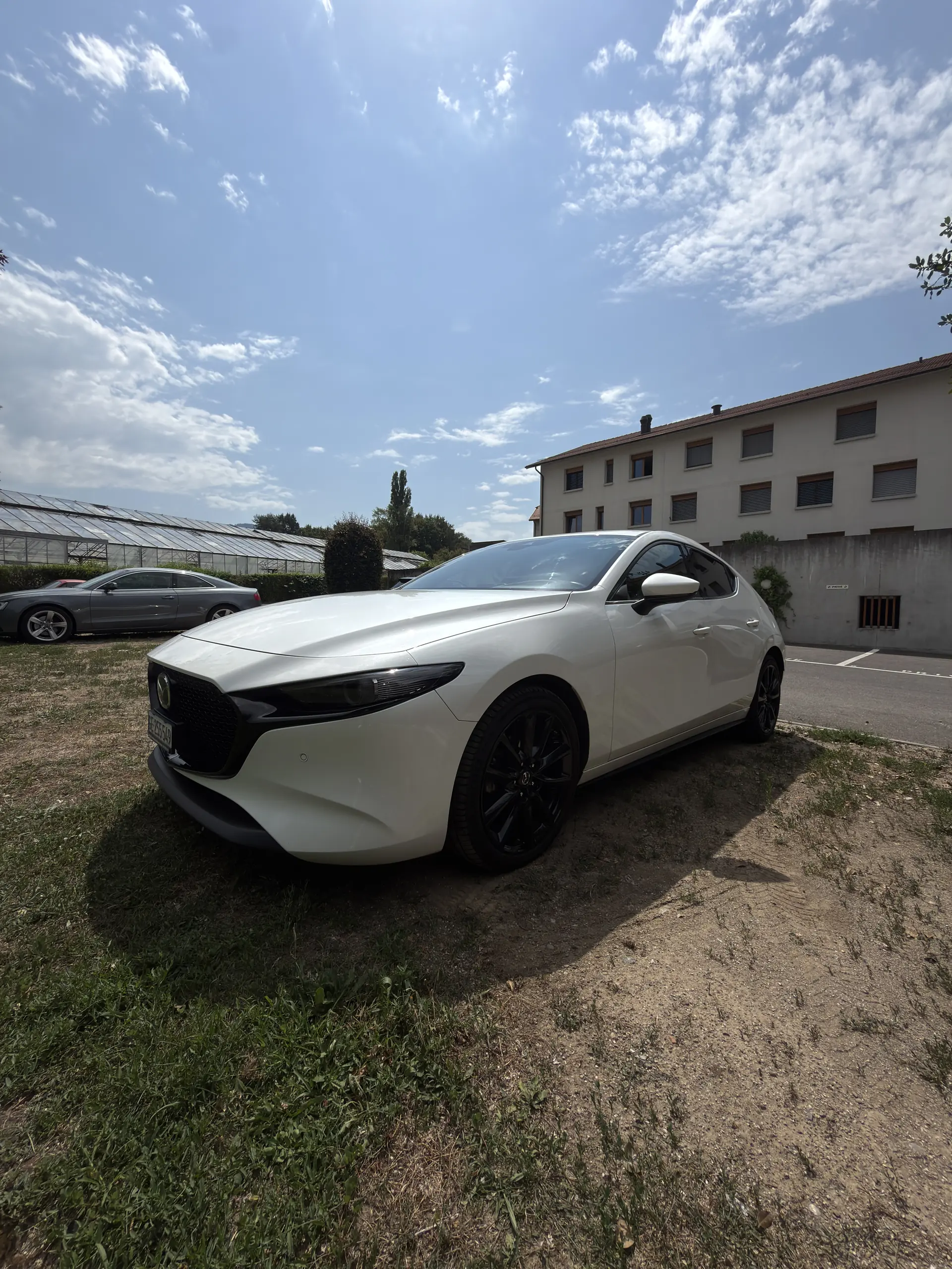 Mazda 3 2.0 180 Revolution AWD — Berline dynamique hybride mild, traction intégrale et faible kilométrage