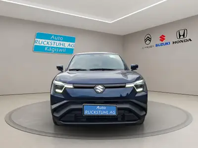 Suzuki e-Vitara Piz Sulai 4x4 — SUV électrique 184 ch, ultra-basse consommation — Heckansicht