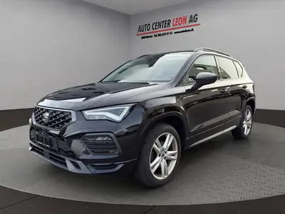 SEAT Ateca 1.5 TSI EVO DSG — SUV complet 4×4 avec attelage, sans accident — fianco