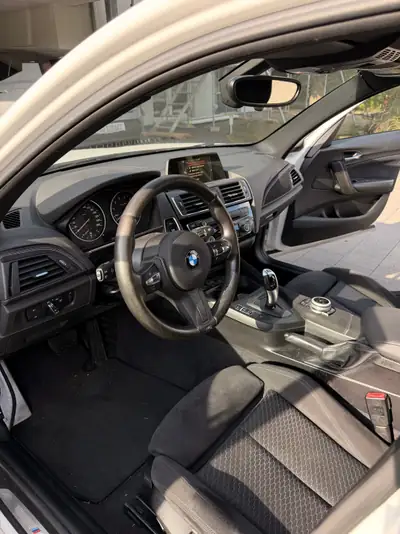 BMW 118i M Sport 2017 — Berline dynamique, moteur efficient et design affirmé — side view