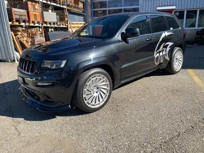 Jeep Grand Cherokee 6.4 V8 HEMI SRT8 — Muscle SUV américain, 468 ch pure performance — fianco