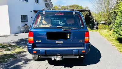 Jeep Grand Cherokee 5.2 V8 Limited — Légende SUV des années 90, moteur muscle américain — tableau de bord