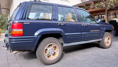 Jeep Grand Cherokee 5.2 V8 Limited — Légende SUV des années 90, moteur muscle américain — Miniature 10