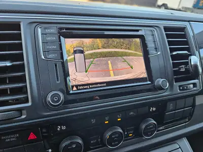 VW T6 2.0 TDI 150 — Monospace 7 places tout-terrain, entretien impeccable — side view