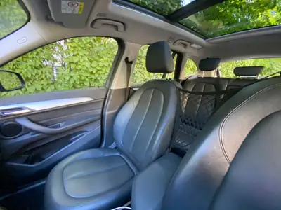 BMW X1 18d xDrive 2016 — SUV compact diesel, équipement premium, faibles émissions — side view