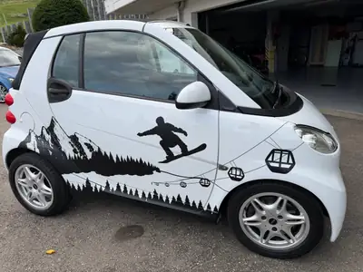 Smart Fortwo 1000 71 Swiss Edition MHD — Cabriolet urbain, consommation record — side view