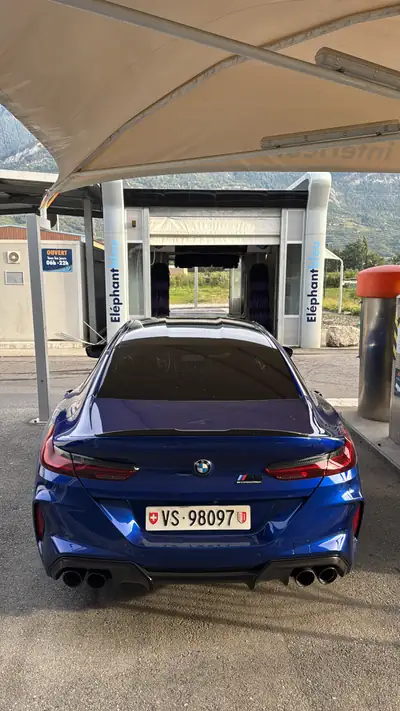 BMW M8 Competition xDrive — Berline sportive 625 ch, faible kilométrage — side view