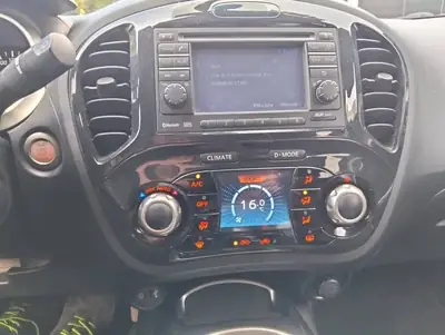 Nissan Juke 1.6 Tekna — Petit SUV urbain, essence efficace et sans sinistre — intérieur