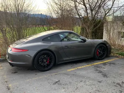 Porsche 911 3.8 Carrera 4 GTS PDK — Sport pur et garantie Approved jusqu'à 2027 — côté