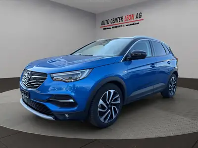 Opel Grandland X 1.2i TP Ultimate — SUV automatique, caméra et navigation intégrée — côté