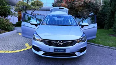 Opel Astra 1.2i Turbo Elegance — Berline fiable, entretien certifié, excellent état — Miniatura 11