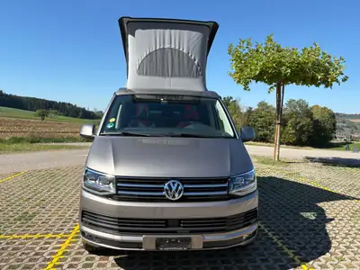 VW T6 2.0 TDI 204 Ocean DSG — Camping-car aménagé, toit électrique et équipement premium — side view