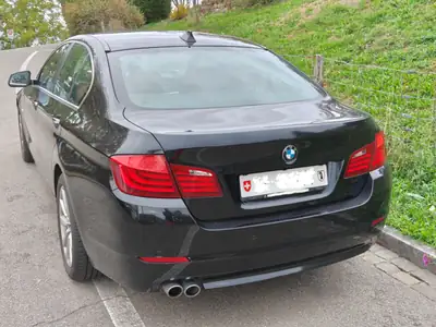 BMW 520d — Berline premium diesel, 184 ch, boîte auto, sans accident — Heckansicht