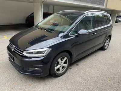 VW Touran 1.5 TSI Highline DSG — Monospace familial spacieux, 7 places modulables — exterior view
