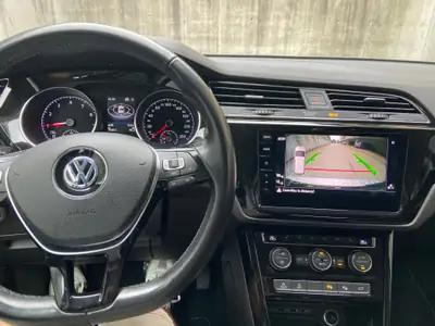 VW Touran 1.5 TSI Highline DSG — Monospace familial spacieux, 7 places modulables — dashboard