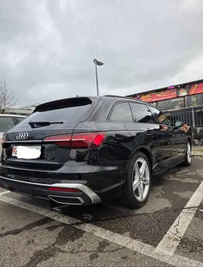Audi A4 S-line 35 TDI — Berline élégante, motorisation hybride légère et faible kilométrage — side view