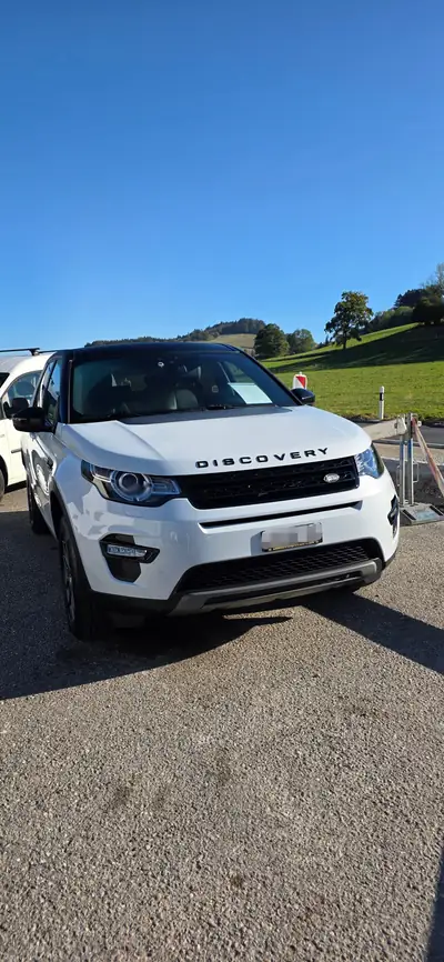 Land Rover Discovery Sport 2.0 Si4 SE — SUV 7 places, 4x4 intégral, faible kilométrage — side view