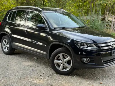 VW Tiguan 2.0 TDI 177 ch — SUV robuste, transmission DSG, kilométrage modéré — side view