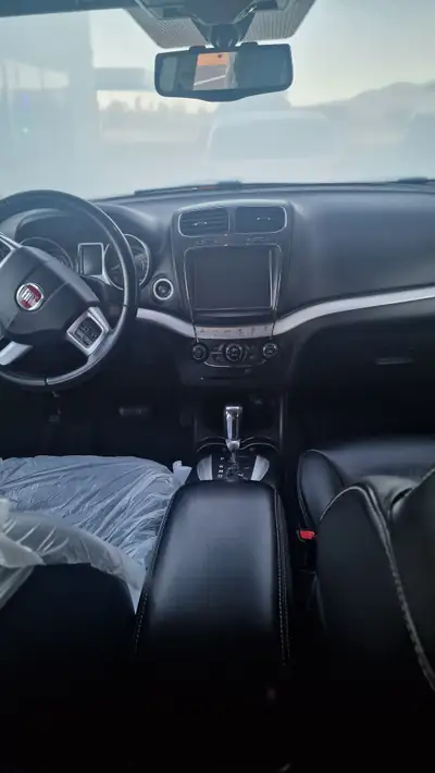 Fiat Freemont 2.0 JTD 170 Lounge 4x4 — 7 places, diesel robuste, transmission automatique — Heckansicht