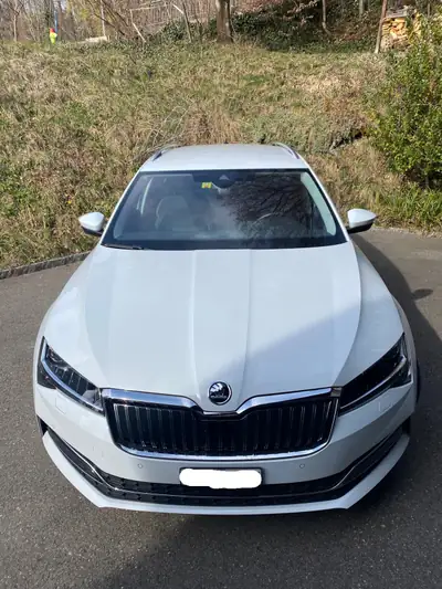 Skoda Superb 1.4 TSI PHEV — Break hybride rechargeable, 93000 km, sans sinistre — side view