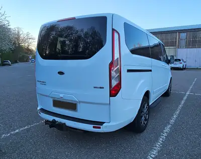 Ford Tourneo Custom 320 L1H1 Titanium X — Monospace 8 places, diesel MHEV économique — côté