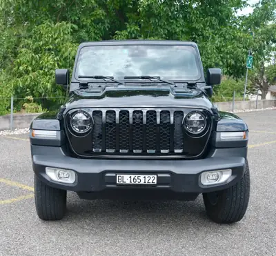Jeep Wrangler 2.0 Turbo 4xe — SUV hybride rechargeable, 381 ch et consommation réduite — vista posteriore