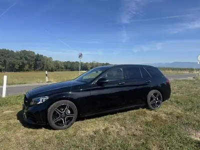 Mercedes-Benz C 200 T AMG Line 4Matic — Break premium, toit panoramique, 72 000 km — fianco