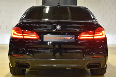 BMW M550d xDrive — Berline sportive diesel, 400 ch, entretien BMW complet — Miniature 8