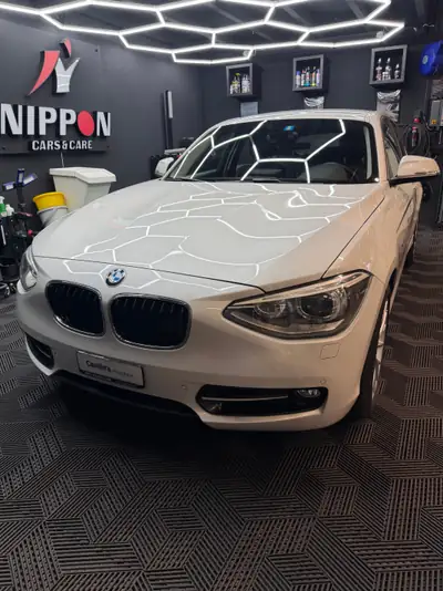 BMW 120d xDrive Sport Line — Diesel performant, 56000 km seulement, traction intégrale — côté