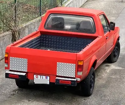 VW Caddy 14D PTT — Utilitaire compact emblématique, 97'500 km, sans sinistre — side view