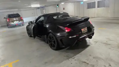 Nissan 350 Z 3.5 V6 24V — Cabriolet sportif mythique, 105'000 km, sans sinistre — side view