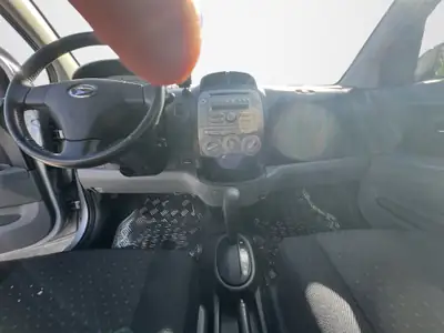 Daihatsu Sirion 1.3 Eco 4WD — Citadine polyvalente, 4 roues motrices et conso maîtrisée — Miniatur 14