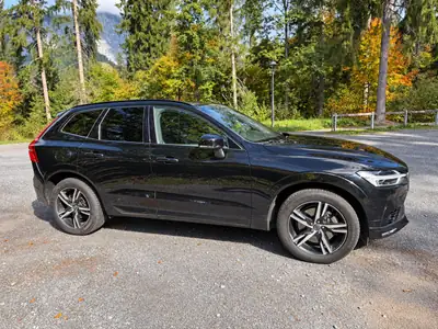 Volvo XC60 2.0 T8 R-Design eAWD — Hybride rechargeable performant, 163 500 km, garantie 2027 — côté