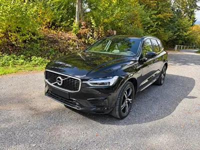 Volvo XC60 2.0 T8 R-Design eAWD — Hybride rechargeable performant, 163 500 km, garantie 2027 — vue extérieure