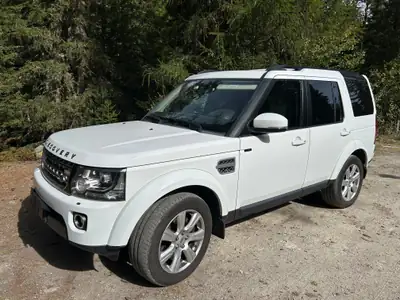 Land Rover Discovery 3.0 SDV6 256 HSE — 7 places, moteur diesel puissant, entretien récent — side view