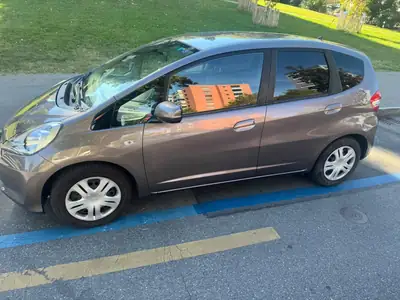 Honda Jazz 1.2i Idle Stop Trend — Citadine polyvalente, faible consommation — fianco