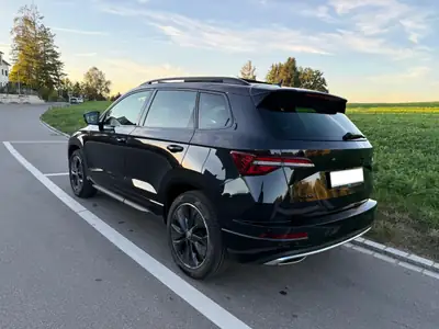Skoda Karoq 2.0 TSI SportLine 4x4 — SUV performant, équipement premium, faible kilométrage — rear view