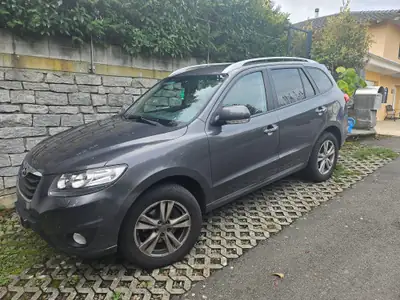Hyundai Santa Fe 2.2 CRDi Premium — 7 places, toit ouvrant, transmission automatique — side view