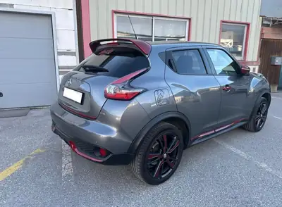 Nissan Juke 1.6 DIG-T Tekna 4x4 — SUV compact dynamique, traction intégrale et caméra 360° — side view