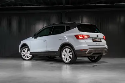 SEAT Arona 1.0 TSI Eco Style DSG — SUV compact polyvalent, quasi neuf, garantie constructeur — fianco