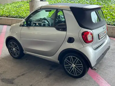 Smart Fortwo 0.9 Passion Cabriolet — Citadine décapotable, 54'000 km, sans sinistre — side view