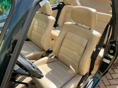 VW Golf 1.8 Cabriolet Classic Line — Décapotable vintage, cuir, moteur fiable — côté