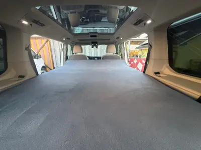 VW T7 Multivan 1.4 eHybrid Liberty DSG — Monospace 7 places hybride rechargeable, 65'000 km — vista posteriore