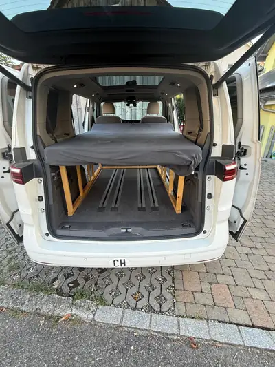 VW T7 Multivan 1.4 eHybrid Liberty DSG — Monospace 7 places hybride rechargeable, 65'000 km — fianco