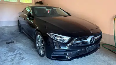 Mercedes-Benz CLS 450 AMG Line 4Matic — Berline élégante, moteur hybride et équipements premium — side view